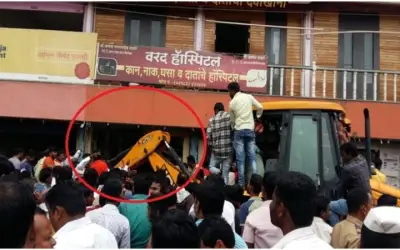बैंक की इमारत का स्लैब गिरने से एक की मौत, 30 लोग फंसे