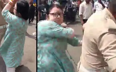 महिला ने गाड़ी रोकने पर पुलिस को मारा और बेहोश होने का किया ड्रामा