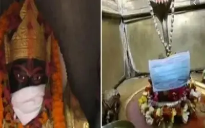 भगवान के मुख पर भी कोरोना से बचने का लगा मास्क