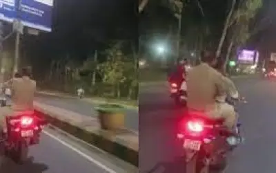 बिना हेलमेट पहने बाइक चलानेवाले पुलिसकर्मियों का युवतियों ने एक किलोमीटर तक पीछा किया, कटा चालान